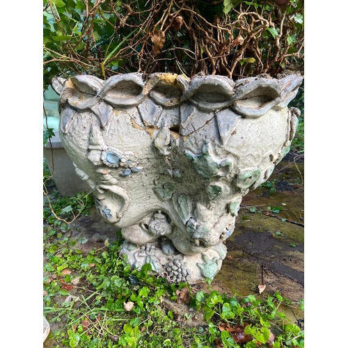 289 - A glazed ceramic planter with platted design around the top and natural scene including a clock in a... 