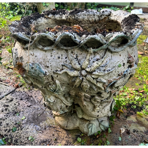 289 - A glazed ceramic planter with platted design around the top and natural scene including a clock in a... 