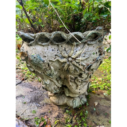 289 - A glazed ceramic planter with platted design around the top and natural scene including a clock in a... 