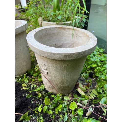 294 - Three composite stone planters/pots tapering to base (H29cm Dia28cm)