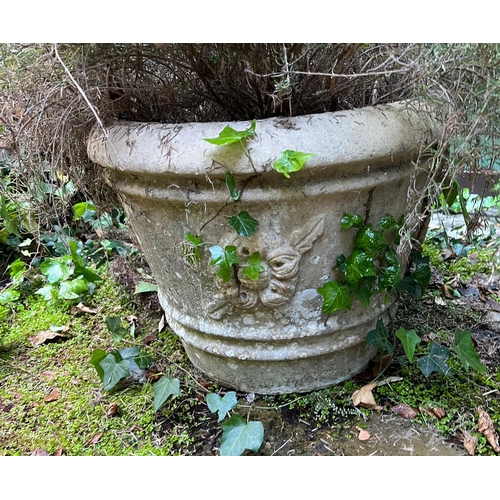 295 - A pair of composite stone  planters with rose crowns to sides (H43cm Dia56cm)