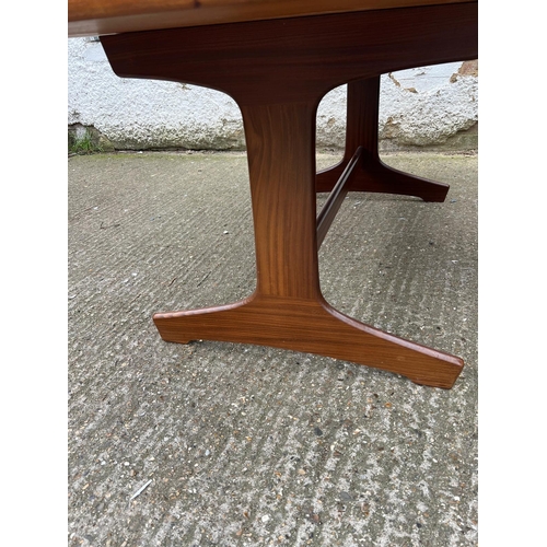 3 - An extending teak dining table by Vanson along with the Vanson for Heals eight chairs whit black pos... 