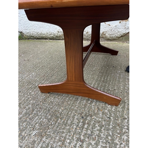 3 - An extending teak dining table by Vanson along with the Vanson for Heals eight chairs whit black pos... 