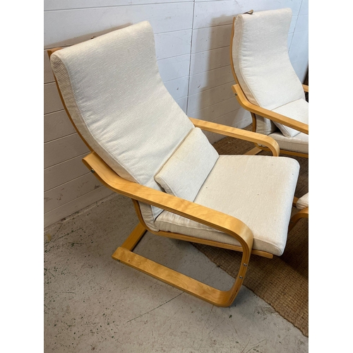 30 - A pair of Ikea Poang chairs and matching footstool