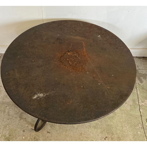 303 - A French style round decorative garden table with scrolling iron work legs (H54cm Dia100cm)