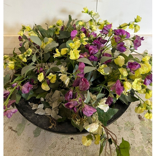 315 - A low circular garden planter with artificial sweet pea flowers (H12cm Dia42cm)