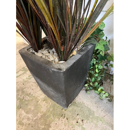 317 - Two garden planters with faux perennial plants (H35cm)