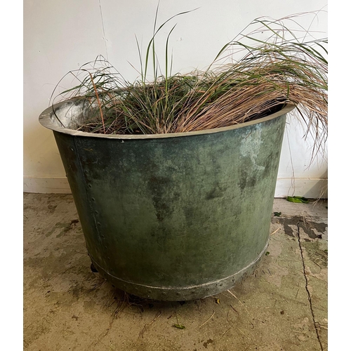 347 - A large galvanised rivetted copper planter/cauldron