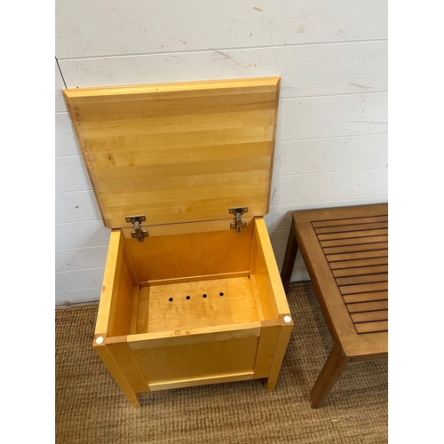 354 - A storage box on legs and a wooden garden table (H45cm Sq50cm)