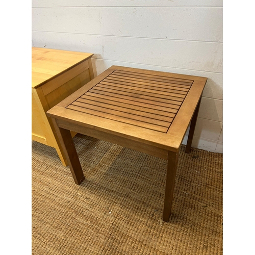 354 - A storage box on legs and a wooden garden table (H45cm Sq50cm)