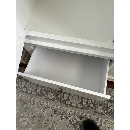 37 - A white three door wardrobe with three drawers below and hanging space above (H200cm W165cm D55cm)