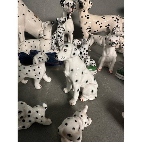 383 - An extensive collection of ornamental dalmatians various makers to include Beswick