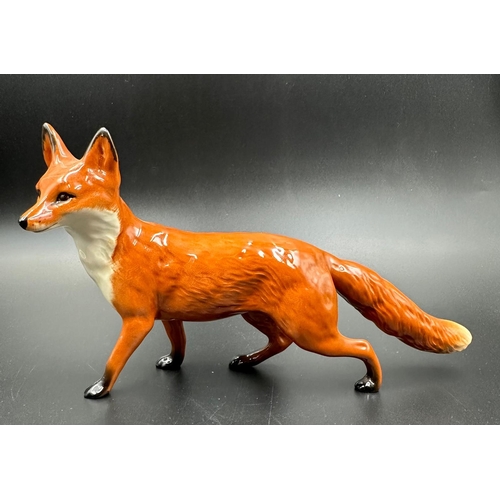 384 - A Beswick figure of a fox