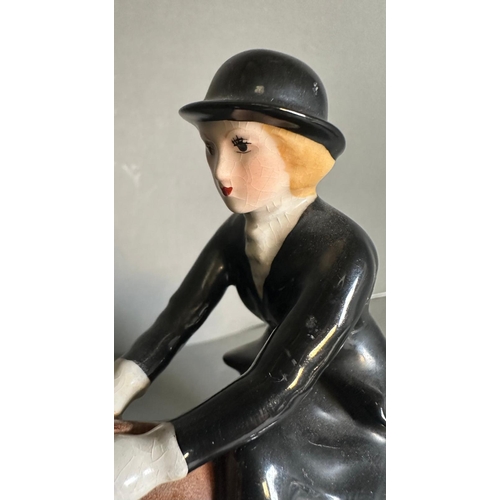 386 - A Beswick figure of a lady riding a hunter AF