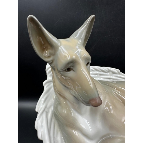 387 - A Lladro figure of a German Shepherd with puppy number 4731