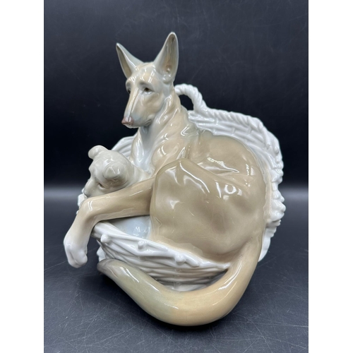 387 - A Lladro figure of a German Shepherd with puppy number 4731