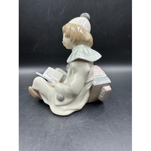 389 - A Lladro figure of Girl with accordion Number 1178