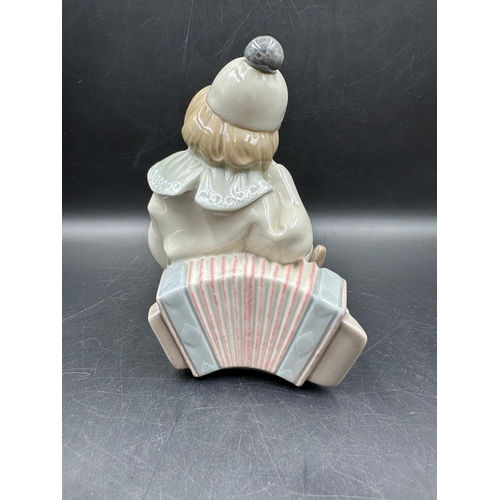 389 - A Lladro figure of Girl with accordion Number 1178