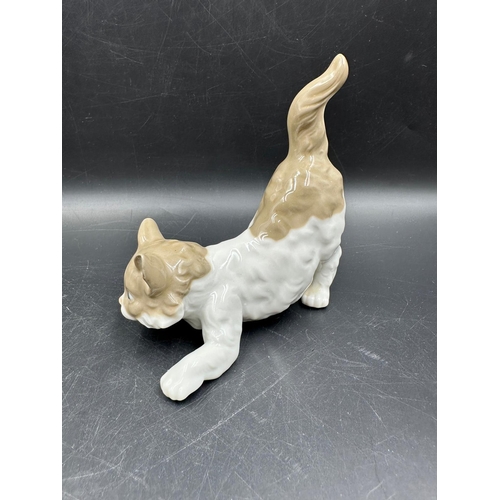 390 - Two Lladro figures Sitting Deer No 1064 and playful cat Number 5091