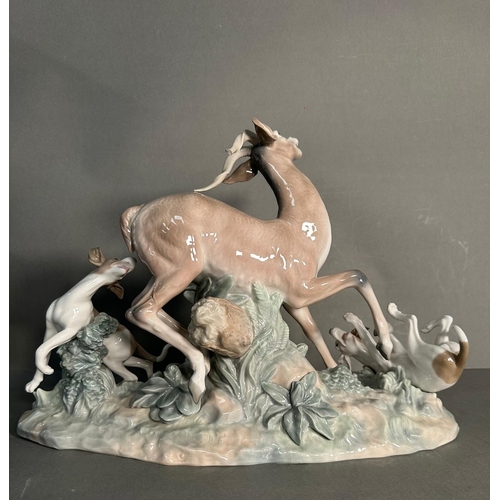 391 - A selection of AF porcelain figures to include Lladro Playful horse no 4597, Fierce pursuit deer and... 