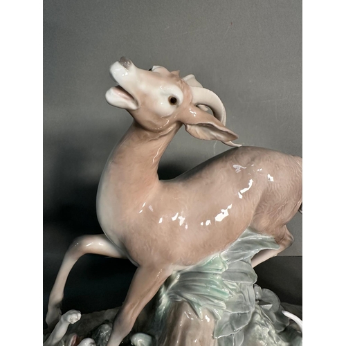 391 - A selection of AF porcelain figures to include Lladro Playful horse no 4597, Fierce pursuit deer and... 