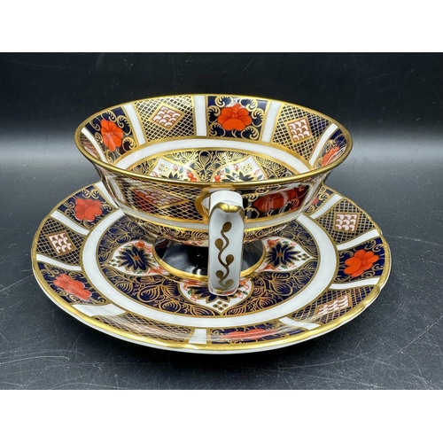 392 - A Royal Crown Derby cup and saucer