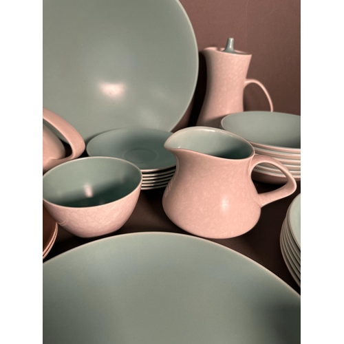 397 - A part pool pottery breakfast set in browns and green and white to include cups, saucers, egg cups a... 