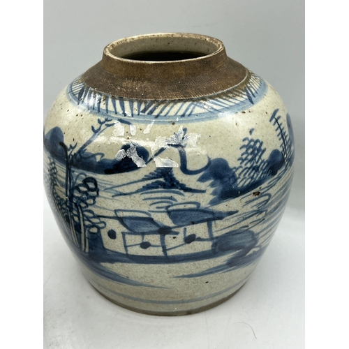 403 - Two blue and white ginger jars in ovoid form landscape design (H18cm)