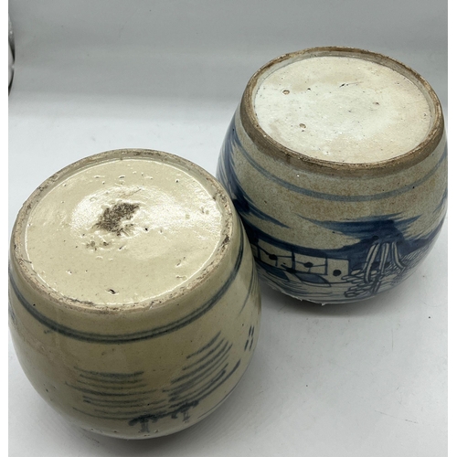 403 - Two blue and white ginger jars in ovoid form landscape design (H18cm)