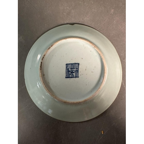 409 - A Chinese Canton celadon ground and famile rose plate