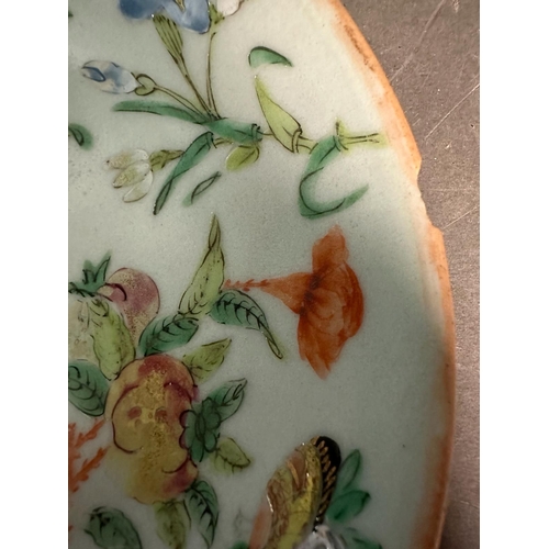 409 - A Chinese Canton celadon ground and famile rose plate