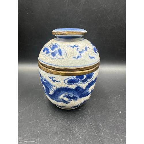 424 - Two blue and white crackle glazed Chinese lidded pots, marked to base