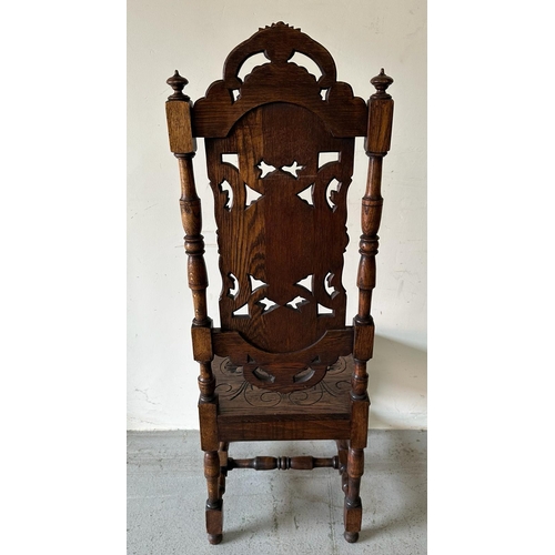 43 - A pair of Victorian style oak hall chairs with carved seats and back, turned supports ending in orna... 