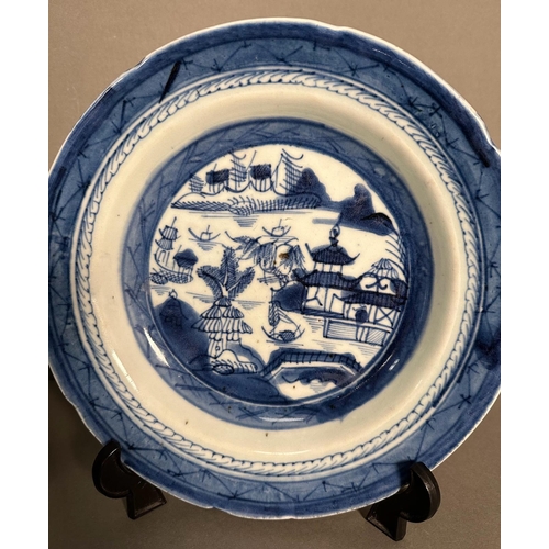 430 - Two Chinese blue and white bowls with village country scene patterns