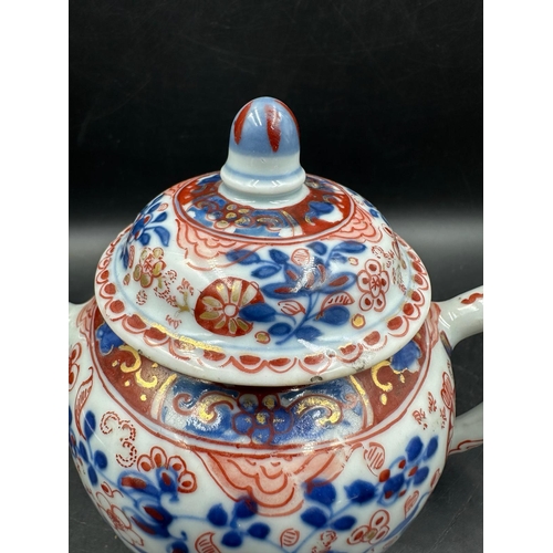 432 - A Chinese globular tea pot with Imari cartouche decoration