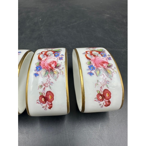 433 - Four Royal Crown Derby napkin rings