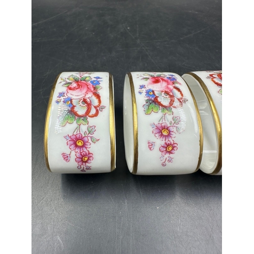 433 - Four Royal Crown Derby napkin rings