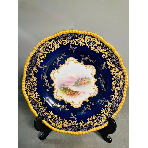 434 - A selection of five early 20th century Coalport hand painted plates with blue grounds, under an acid... 