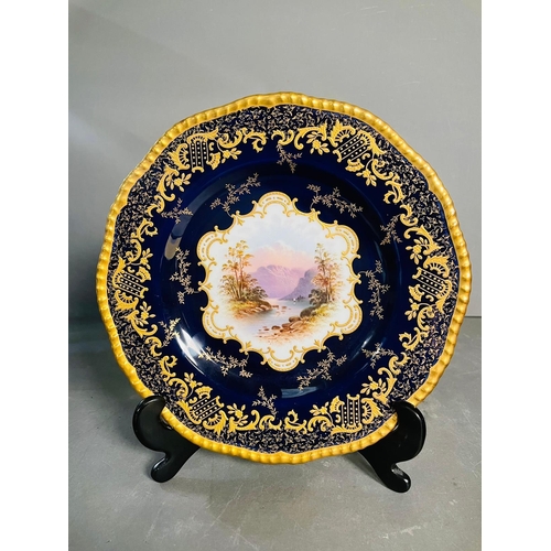 434 - A selection of five early 20th century Coalport hand painted plates with blue grounds, under an acid... 