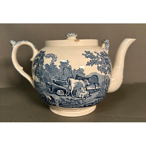 436 - A large blue and white ceramic tea pot decorated in a pastoral farm yard scene by Adams