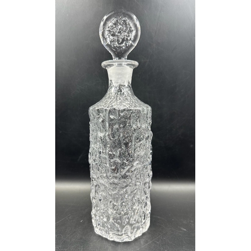 441 - Two Whitefriars clear glass decanters in a moulded bark style form