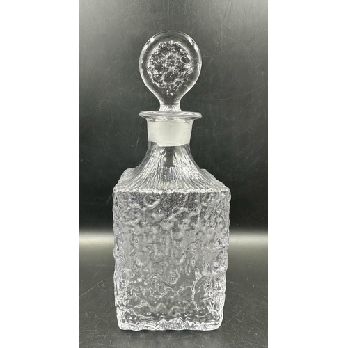 441 - Two Whitefriars clear glass decanters in a moulded bark style form