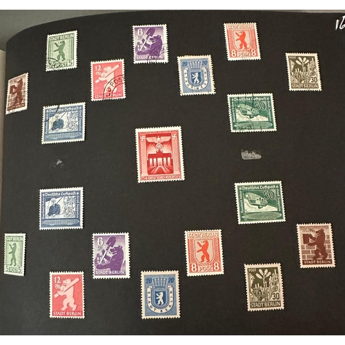 454 - A WWII era German stamp album with a range of various stamps, denominations and issues.