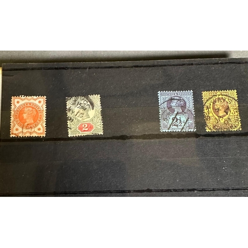 458 - A selection of philatelic accessories to include blank albums and sheets, stamps mounts and a uv tes... 