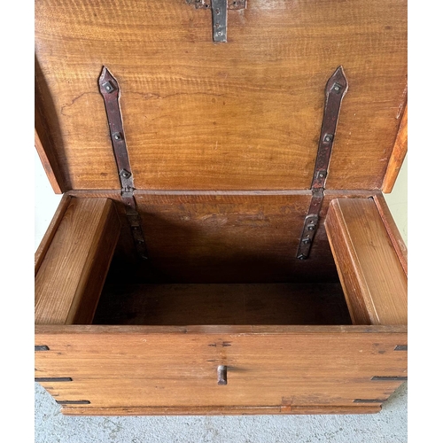 46 - A Middle Eastern style storage trunk with brass handles, metal brackets to corners and diamond inlay... 