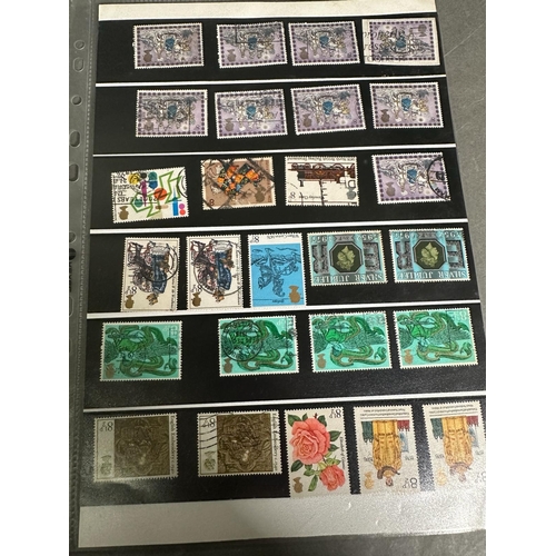 460 - A selection of UK and World stamp sheets and two albums to include the USA, Paraguay and The Philipp... 