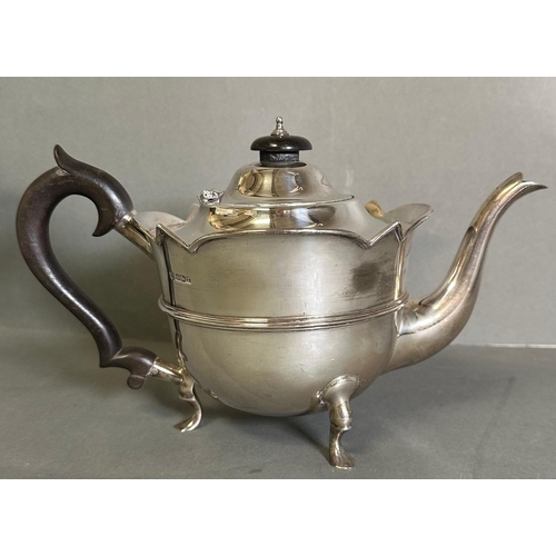 474 - A three piece silver tea service to include a teapot, milk jug, and sugar bowl by Watson & Gillott h... 