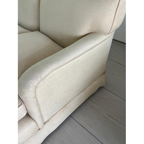 48 - Three seater cream sofa by Peter Dudgeon (W210cm D98cm SH49cm)