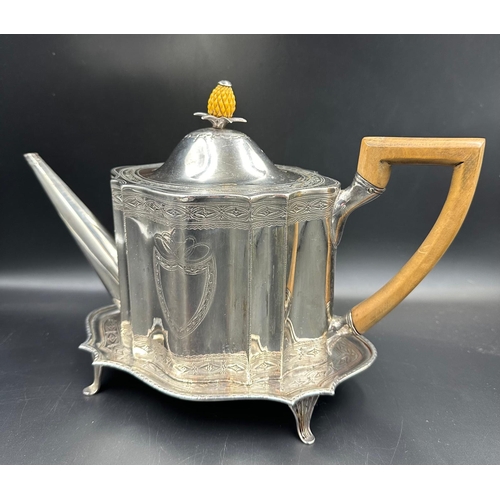 486 - A Georgian silver teapot on stand, hallmarked for Edinburgh 1816 with a makers mark of AS, with a co... 