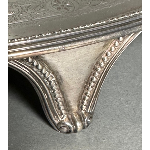 489 - A William IV silver tray on four feet, approximately 43.5cm in length and an approximate total weigh... 